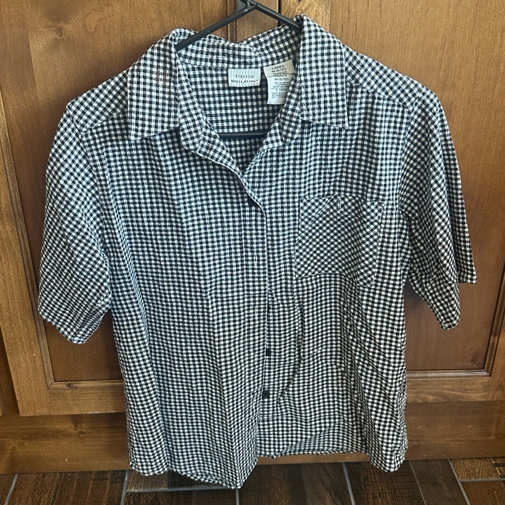 Women’s black and white checked blouse